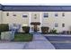 Condo building exterior featuring a classic design, landscaping, and ample parking at 1500 Gay Rd # 7A, Winter Park, FL 32789