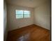 Spacious bedroom with hardwood floors at 2306 Dawnwood Ln, Orlando, FL 32809