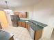 Kitchen boasts stainless steel dishwasher and sink at 2485 Huron Cir, Kissimmee, FL 34746