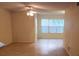 Living room with tile floor and bay window at 4572 Commander Dr # 1227, Orlando, FL 32822