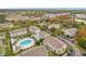 Aerial view of the community pool and surrounding townhouses at 5269 Wellington Park Cir # 23, Orlando, FL 32839