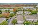 Aerial view of townhouse community, showing building location and surrounding landscape at 5269 Wellington Park Cir # 23, Orlando, FL 32839