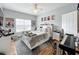 Bedroom with a queen-size bed and themed decor at 5269 Wellington Park Cir # 23, Orlando, FL 32839
