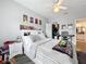 Bedroom with a queen-size bed, themed decor, and closet access at 5269 Wellington Park Cir # 23, Orlando, FL 32839