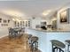 Kitchen with granite countertops, stainless steel appliances, and a dining area at 5269 Wellington Park Cir # 23, Orlando, FL 32839