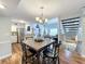 Open concept dining area with kitchen view at 5269 Wellington Park Cir # 23, Orlando, FL 32839