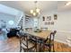Charming dining area with rustic table and chairs at 5269 Wellington Park Cir # 23, Orlando, FL 32839
