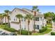 Two-story building with palm trees and landscaping at 5269 Wellington Park Cir # 23, Orlando, FL 32839
