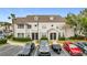 Two-story building with parking and landscaping at 5269 Wellington Park Cir # 23, Orlando, FL 32839