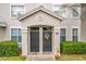 Two-unit building with welcoming entryway and landscaping at 5269 Wellington Park Cir # 23, Orlando, FL 32839
