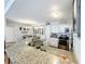 Modern kitchen with granite countertops and stainless steel appliances at 5269 Wellington Park Cir # 23, Orlando, FL 32839