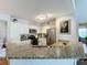 Modern kitchen with granite countertops and stainless steel appliances at 5269 Wellington Park Cir # 23, Orlando, FL 32839