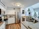 Modern kitchen features stainless steel appliances and granite countertops at 5269 Wellington Park Cir # 23, Orlando, FL 32839