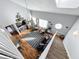 Upstairs living area with high ceilings and cozy seating at 5269 Wellington Park Cir # 23, Orlando, FL 32839