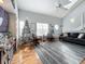 Living room with hardwood floors, fireplace and Christmas tree at 5269 Wellington Park Cir # 23, Orlando, FL 32839