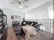 Spacious loft area with a comfortable sofa and TV at 5269 Wellington Park Cir # 23, Orlando, FL 32839