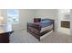 Simple bedroom with a full-size bed at 12128 Illustration Dr, Orlando, FL 32832