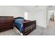 Simple bedroom with a full-size bed and dresser at 12128 Illustration Dr, Orlando, FL 32832