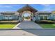 Attractive community entrance with covered walkway at 12128 Illustration Dr, Orlando, FL 32832