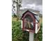 Little Free Library filled with books, community feel at 12128 Illustration Dr, Orlando, FL 32832