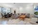 Spacious living room with sectional sofa and coffee table at 12128 Illustration Dr, Orlando, FL 32832
