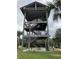 Wooden observation tower with multiple levels and stairs at 12128 Illustration Dr, Orlando, FL 32832