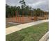 Community fitness area with outdoor exercise equipment at 12128 Illustration Dr, Orlando, FL 32832