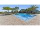 Resort-style pool with spacious deck and lounge chairs at 12128 Illustration Dr, Orlando, FL 32832