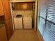 Laundry room with washer, dryer and cabinets at 1310 Stearman Ct # 4, Orlando, FL 32825