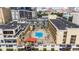 Aerial view of apartment building with swimming pool and courtyard at 151 E Washington St # 424, Orlando, FL 32801