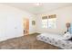 Bright bedroom with a double bed and ensuite bathroom at 1784 Coriander Dr, Kissimmee, FL 34759