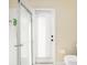 Bathroom with shower and exterior access at 1855 S Lehigh Dr, Deltona, FL 32738