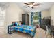 bedroom with a single bed, dresser, and window seat at 1855 S Lehigh Dr, Deltona, FL 32738