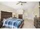 Bright Primary bedroom with ensuite bathroom access and large windows at 1855 S Lehigh Dr, Deltona, FL 32738