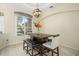 Casual dining area with dark wood table and bench seating at 1855 S Lehigh Dr, Deltona, FL 32738