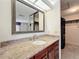 Bathroom features a vanity with granite countertop and a shower at 2 Escondido Cir # 190, Altamonte Springs, FL 32701