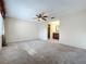 Spacious bedroom with ceiling fan and carpet flooring at 2 Escondido Cir # 190, Altamonte Springs, FL 32701