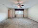 Bright bedroom with carpeted floor, ceiling fan, and window coverings at 2 Escondido Cir # 190, Altamonte Springs, FL 32701