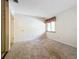 Simple bedroom with carpet, window, and closet at 2 Escondido Cir # 190, Altamonte Springs, FL 32701