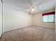 Bedroom with ceiling fan and window at 2 Escondido Cir # 190, Altamonte Springs, FL 32701