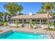 Community pool with adjacent clubhouse at 2 Escondido Cir # 190, Altamonte Springs, FL 32701