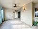 Sunlit enclosed patio with tile floors and sliding glass doors at 2 Escondido Cir # 190, Altamonte Springs, FL 32701