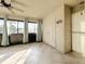 Spacious enclosed patio with tile floors, large windows, and ceiling fan at 2 Escondido Cir # 190, Altamonte Springs, FL 32701