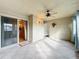 Enclosed patio features tile flooring, ceiling fan, and access to interior rooms at 2 Escondido Cir # 190, Altamonte Springs, FL 32701