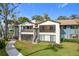 Condo building exterior with landscaping and walkway at 2 Escondido Cir # 190, Altamonte Springs, FL 32701