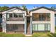 Two-story condo building with stairs and screened patio at 2 Escondido Cir # 190, Altamonte Springs, FL 32701
