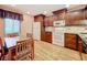 Modern kitchen with wood cabinets and granite countertops at 2 Escondido Cir # 190, Altamonte Springs, FL 32701