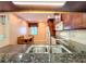 Kitchen features granite countertops and a breakfast bar at 2 Escondido Cir # 190, Altamonte Springs, FL 32701