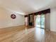Living room with fireplace and sliding glass doors to patio at 2 Escondido Cir # 190, Altamonte Springs, FL 32701