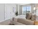 Relaxing main bedroom with large bed, natural light, and a neutral color palette at 2770 Puffin Pl, Davenport, FL 33837